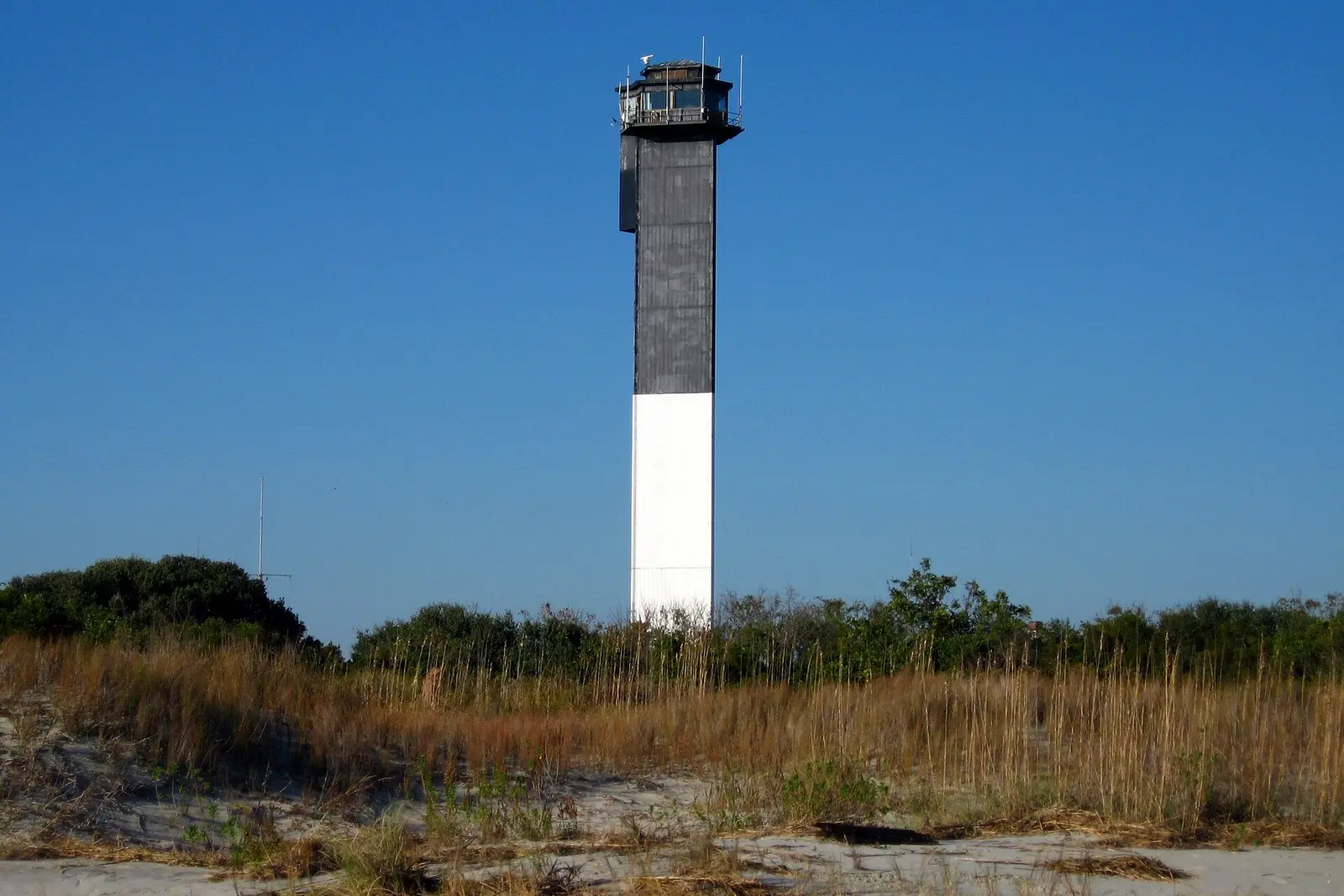 The Sullivan's Island lighthouse behind the dunes, SC
